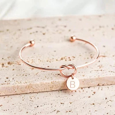 AC "TIE THE KNOT" INITIAL BRACELET