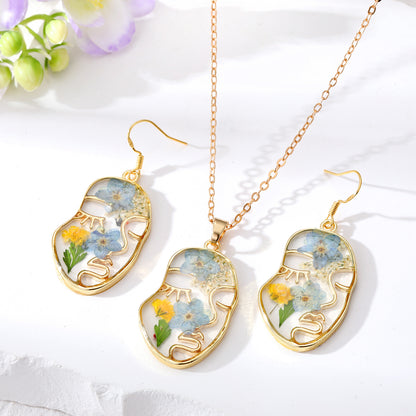 Abstract Face Gold plated Earrings handmade with pressed flowers🌸