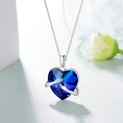 Blue Crystal Heart Hug Necklaces