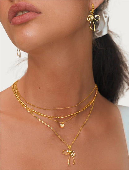 The Bow Earrings in Gold