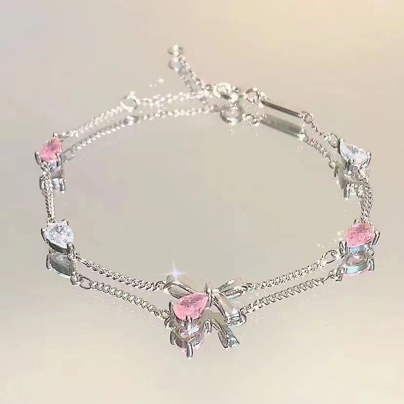 FLORAL BOW AND STAR BRACELET