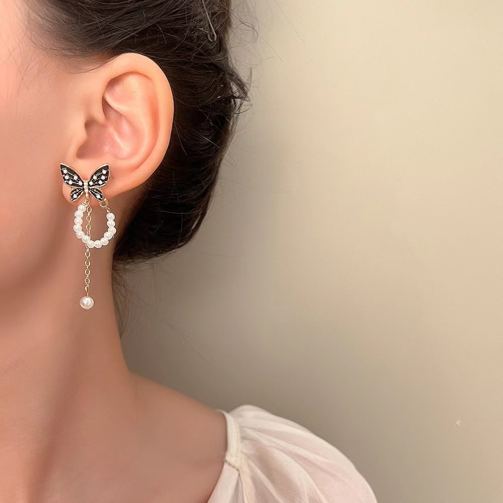 - Butterfly Pearl Chain Earrings