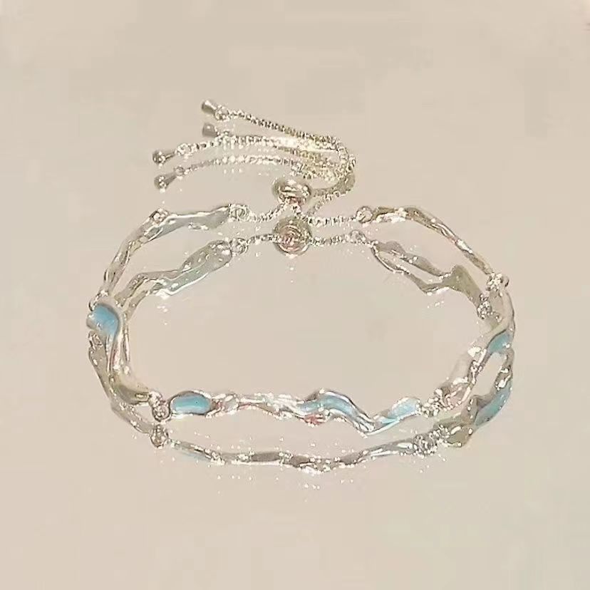 FLORAL BOW AND STAR BRACELET