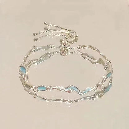 FLORAL BOW AND STAR BRACELET