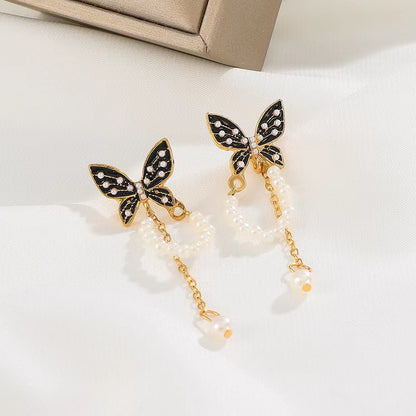 - Butterfly Pearl Chain Earrings