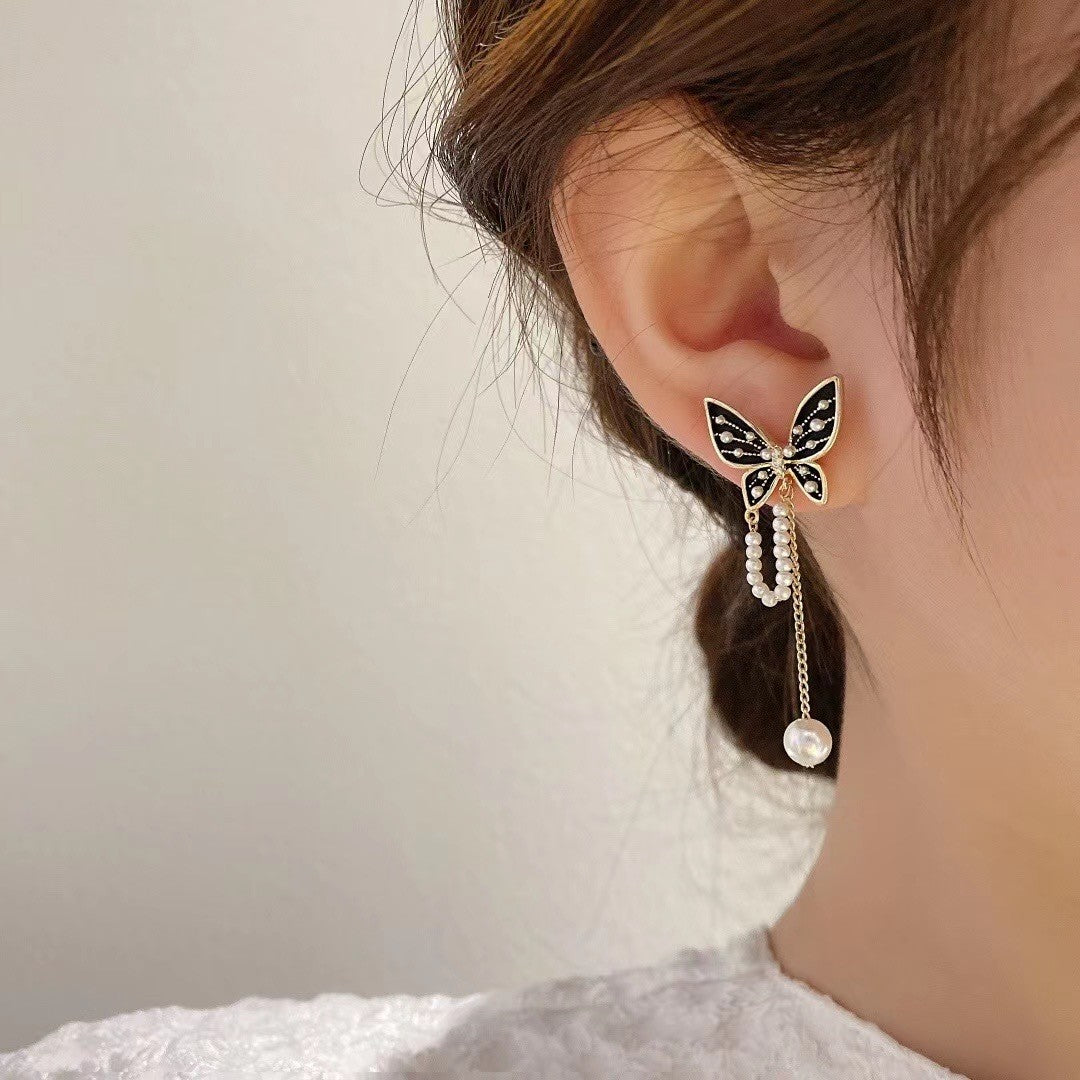 - Butterfly Pearl Chain Earrings