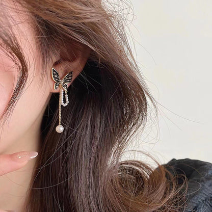 - Butterfly Pearl Chain Earrings