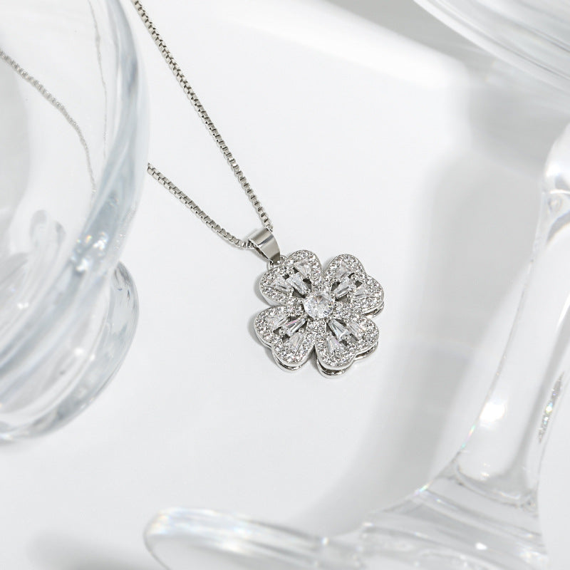 Spinning Heart Clover Necklace