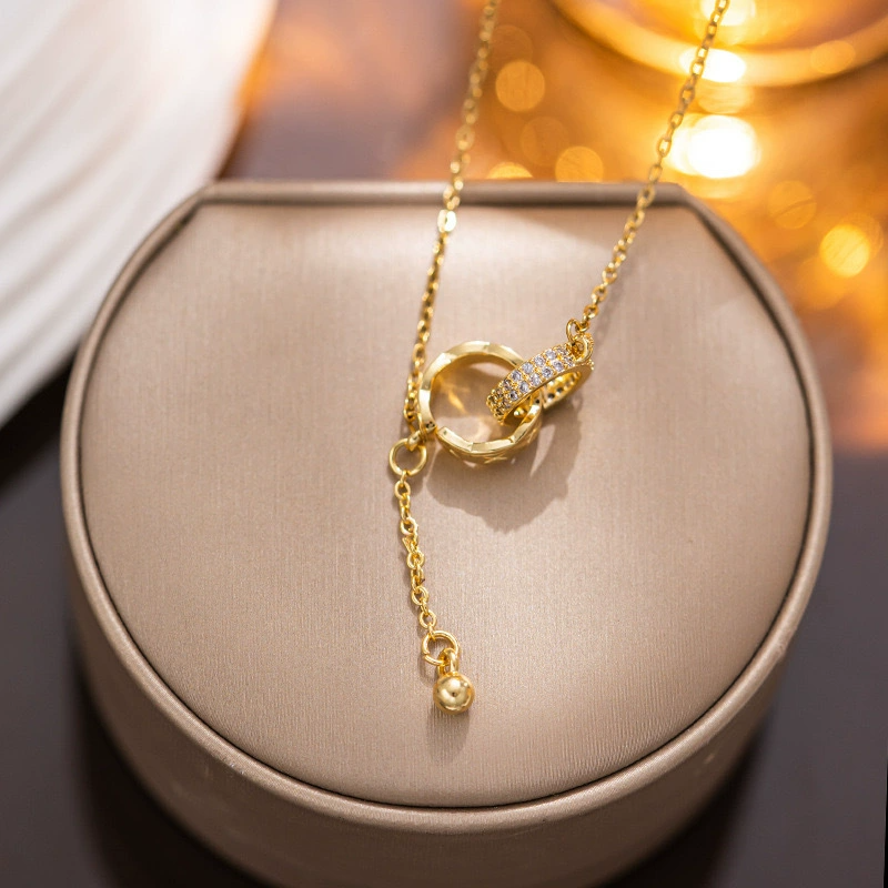 “Linked in Time” – Interlocked Double Ring Tassel Necklace