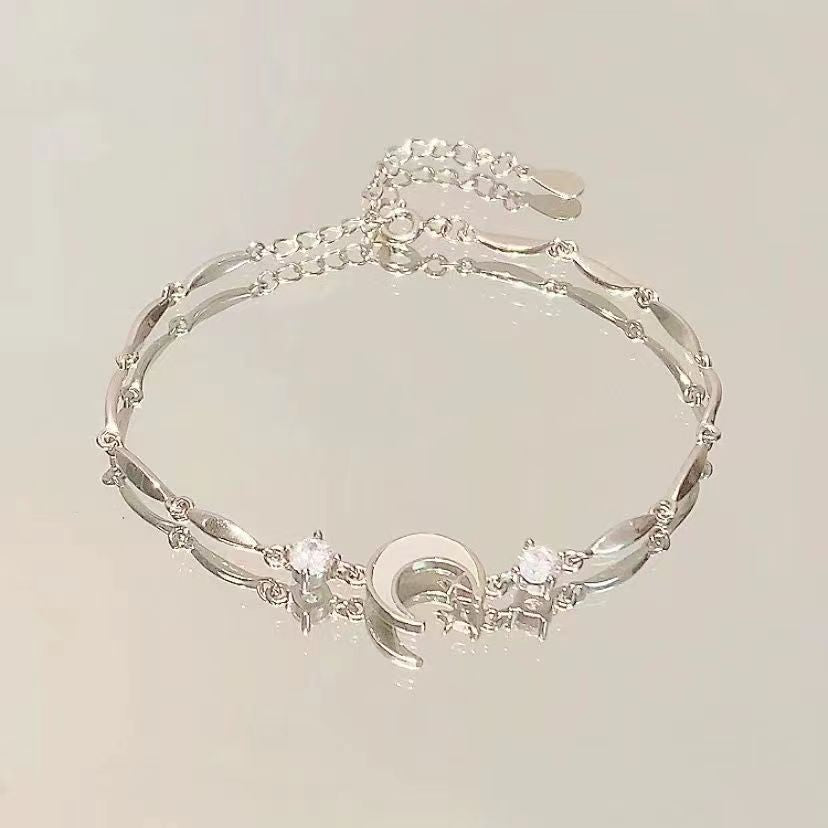 FLORAL BOW AND STAR BRACELET