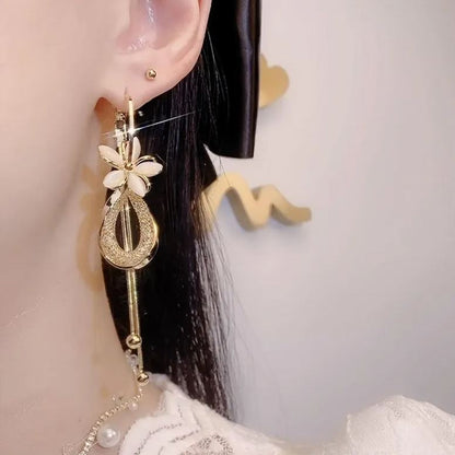 - Cat's Eye Stone Flower Tassel Earrings
