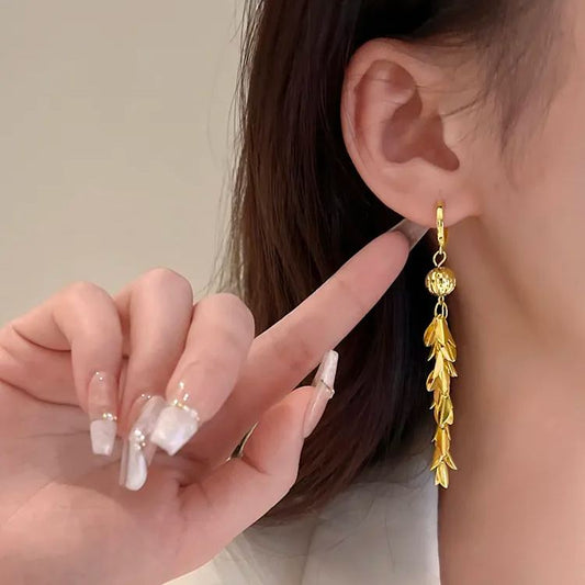 - Gold Leaf Lucky Beads Tassel Earrings