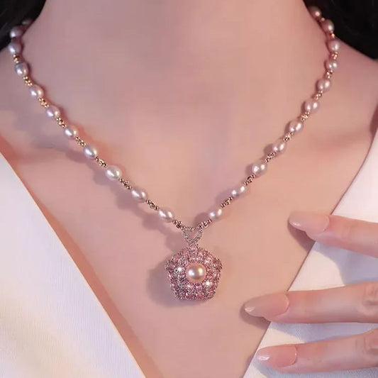 - Pink Rotating Pearl Lucky Flower Necklace