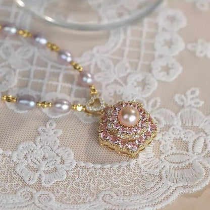 - Pink Rotating Pearl Lucky Flower Necklace