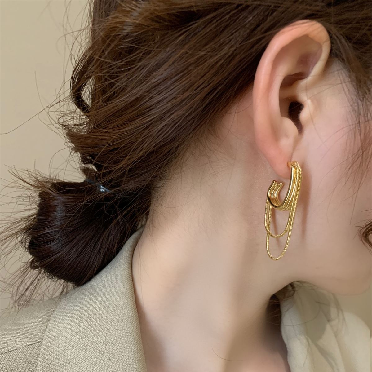 - Metal Multi-Chain Tassel Earrings
