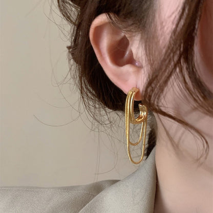 - Metal Multi-Chain Tassel Earrings