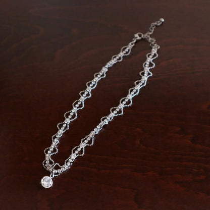 French Metal Lace Zircon Pendant