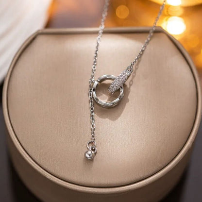 “Linked in Time” – Interlocked Double Ring Tassel Necklace
